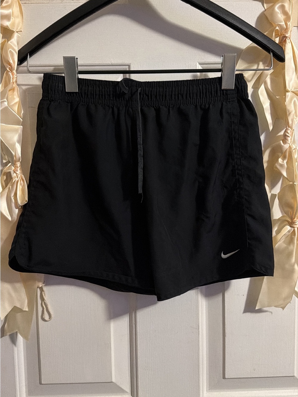 Nike Black Women's Athletic Shorts with Silver Swoosh